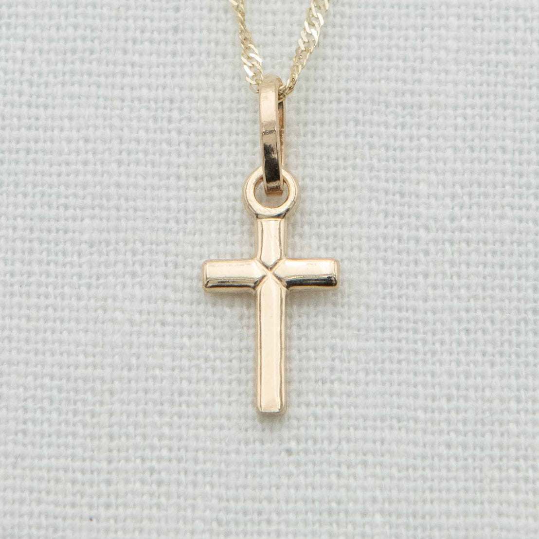Small cross charm on chain with lace