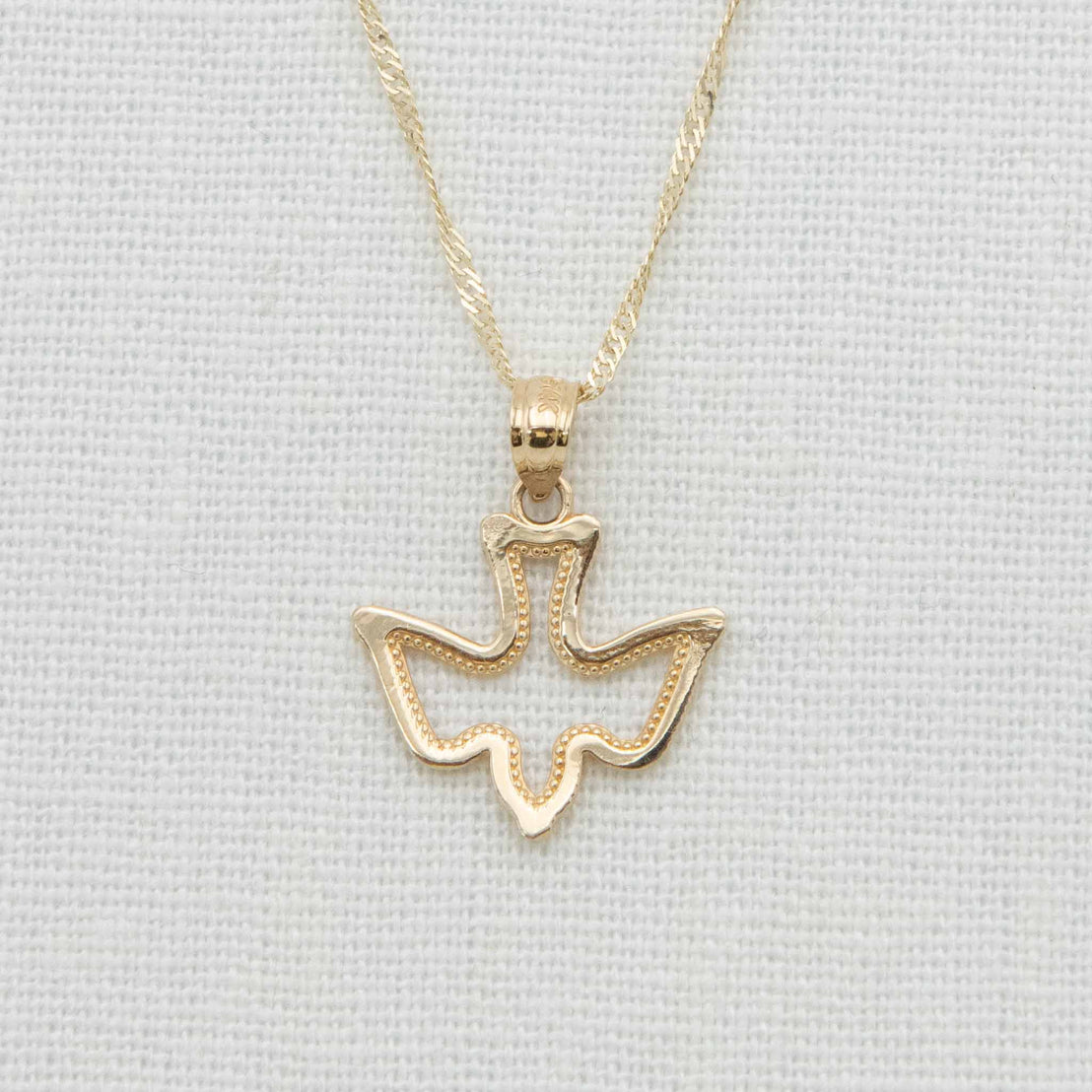 Gold dove charm necklace