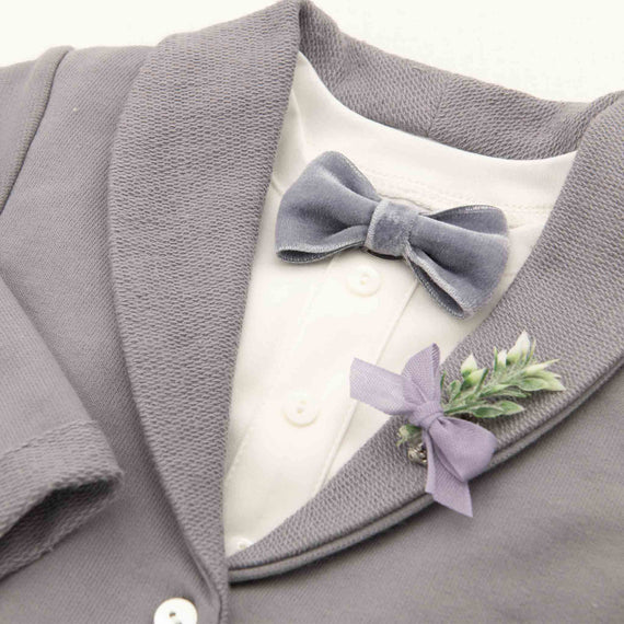 Flat lay photo of the Ezra French Terry Jacket with attached velvet bow tie and boutonniere