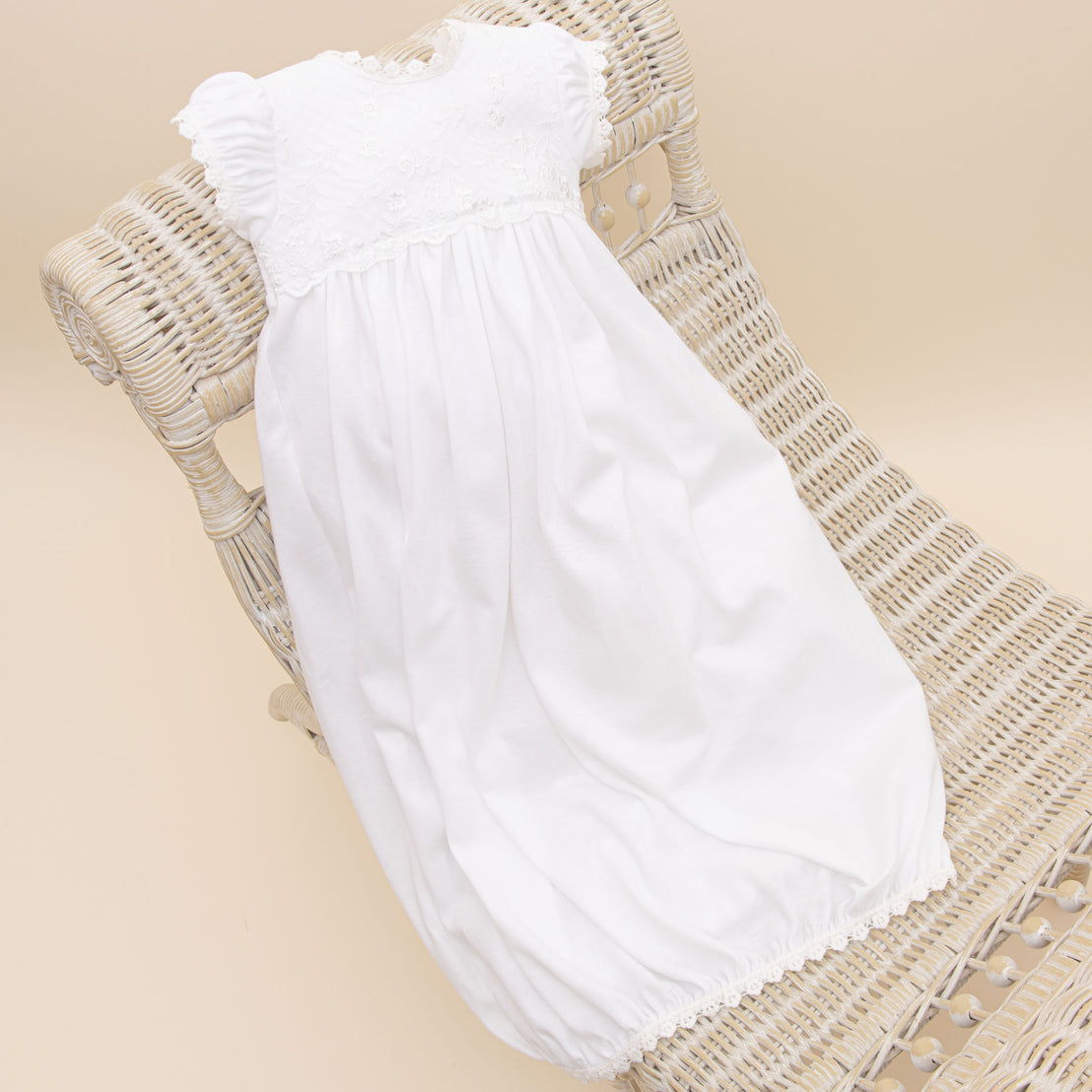 Photo of the full length of the Ella baptism layette