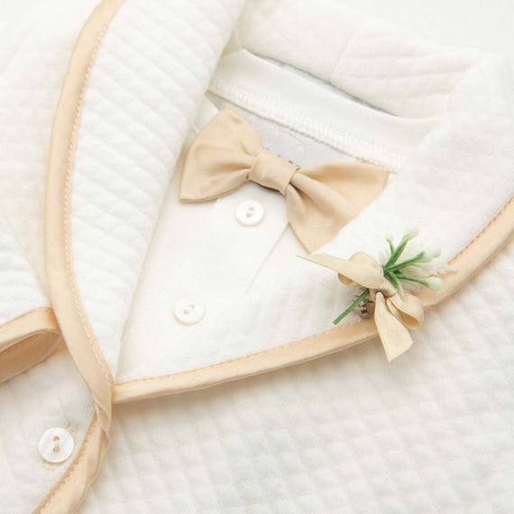 Gold Silk Bow Tie on onesie shirt with ivory quilt jacket and boutonniere