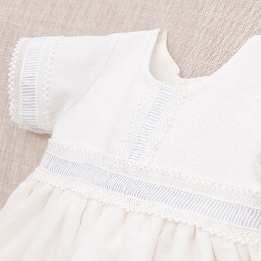 Close up of the bodice of the Rowan linen boys baptism gown. 