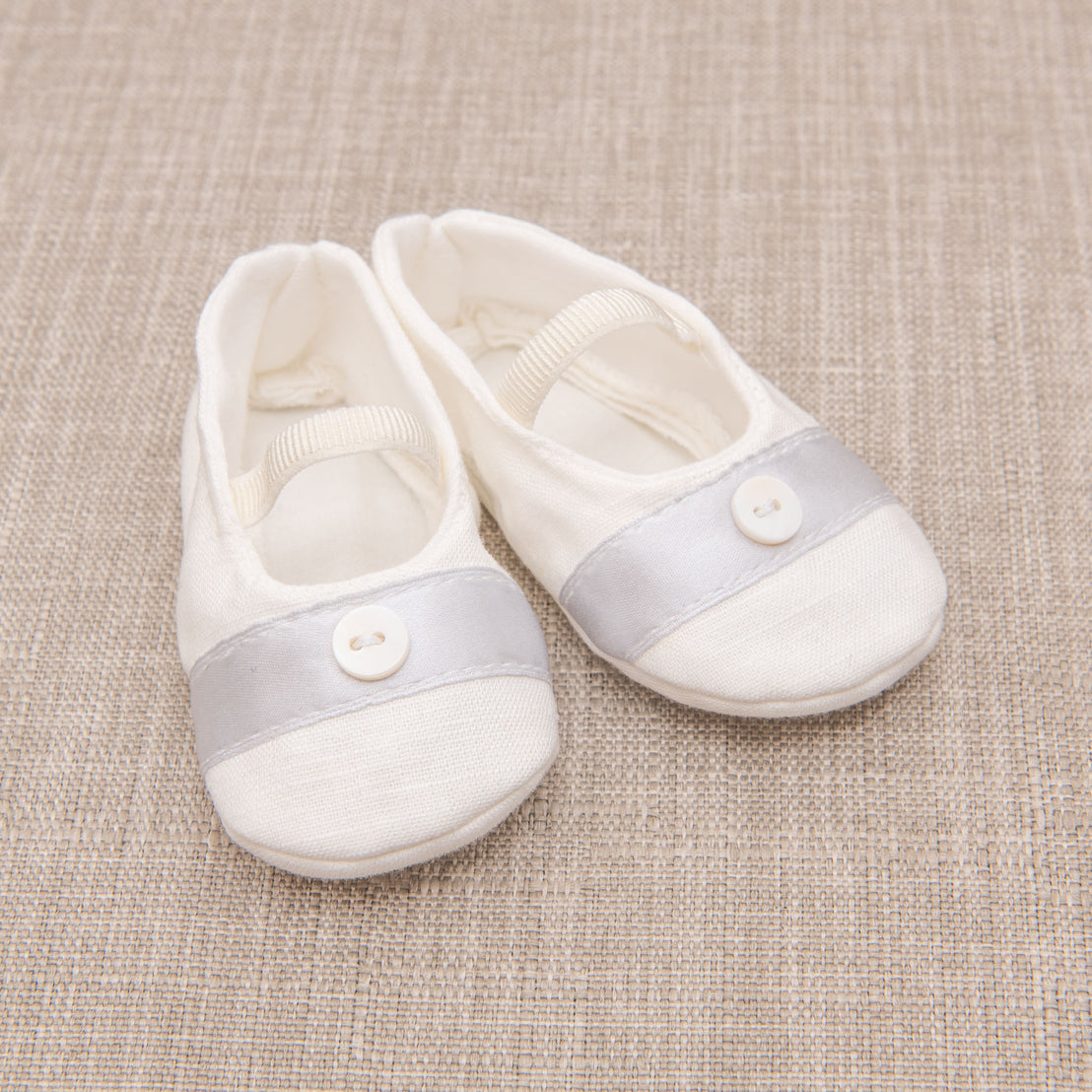 A pair of baptism shoes, lined in a blue silk.
