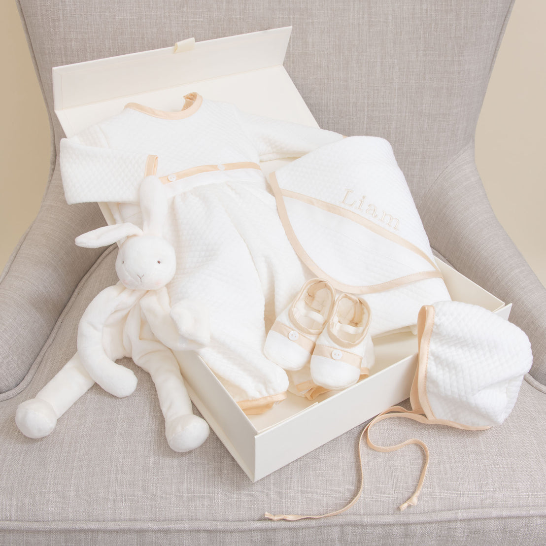 Contents of the Liam Newborn Romper Gift Box Set, including Romper, Bonnet, Booties, Bunny, and Blanket (Personalization Optional)