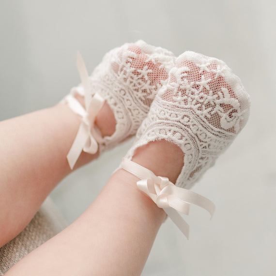 Charlotte lace baby booties with pink silk ribbon ties for baby girl