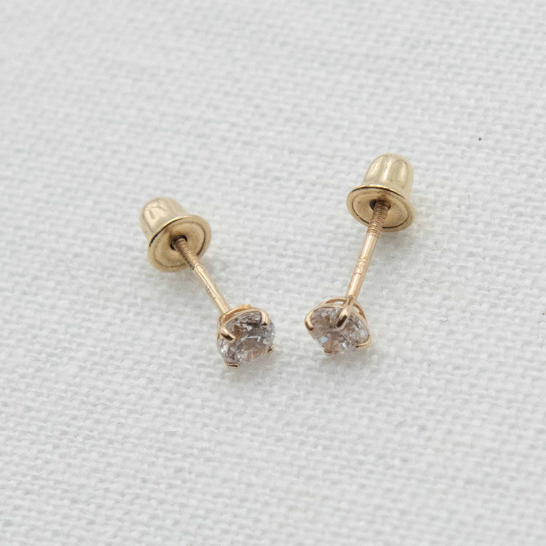 Gold stud earrings with screw on backs