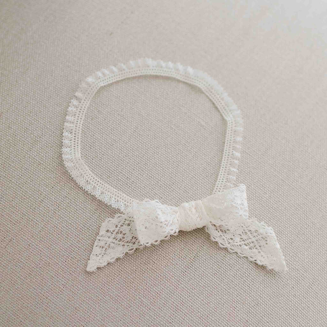 Hailey lace bow headband flat lay