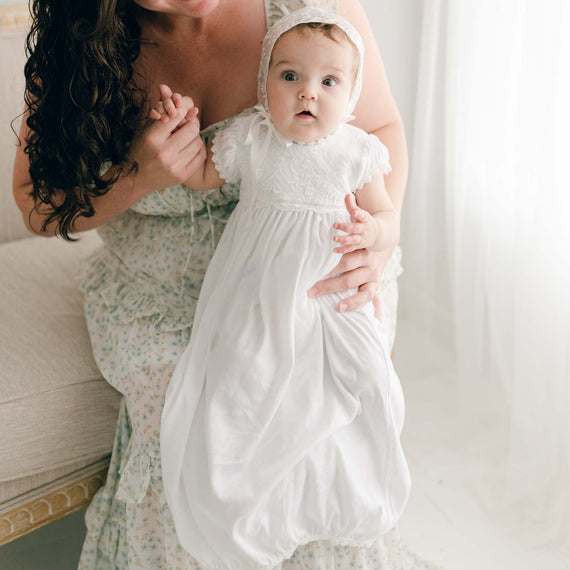 baby girl with mom wearing the ella baby girl layette 