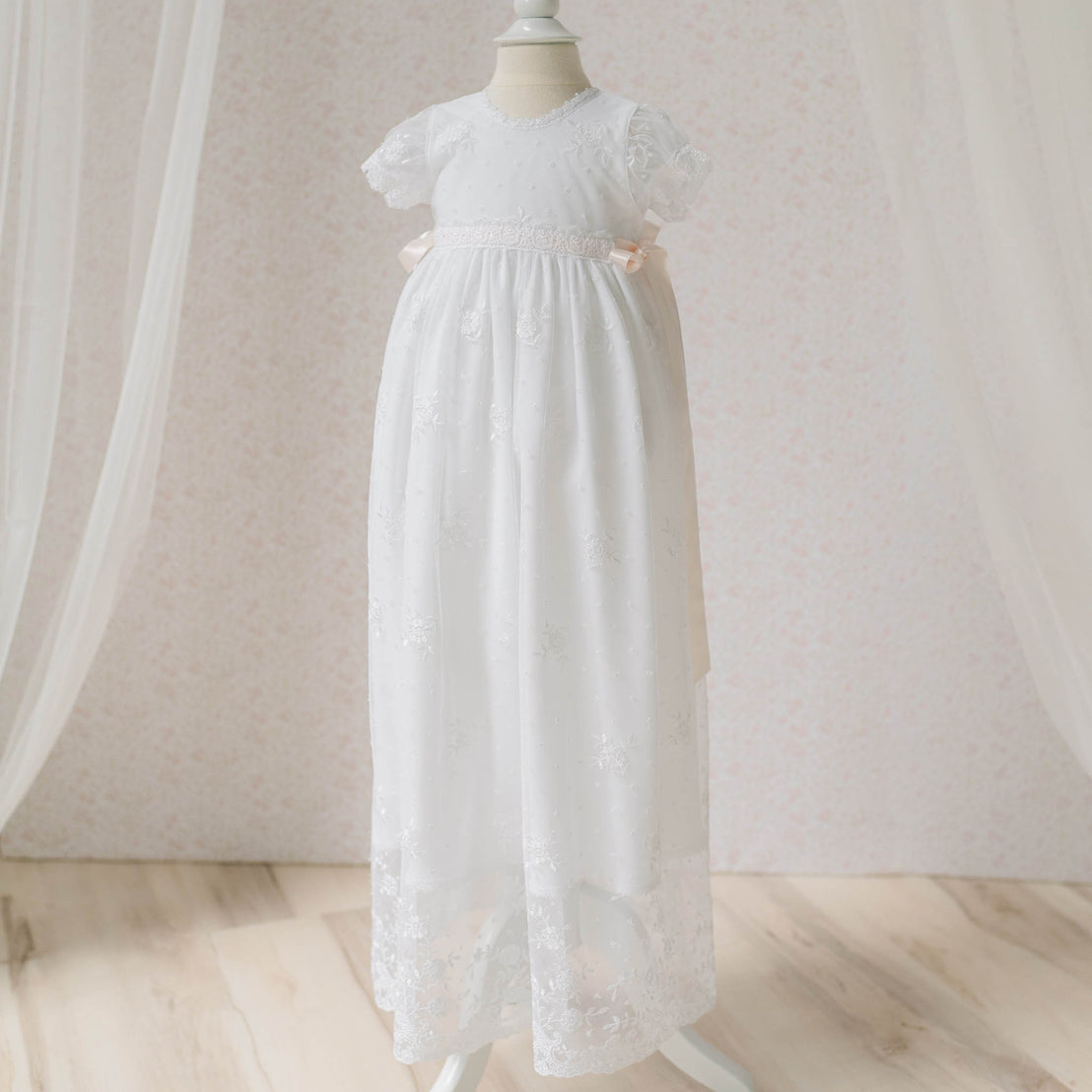 Full length view of the Melissa Christening Gown on a mannequin against a neutral background. Perfect for a christening, baptism, or baby blessing.