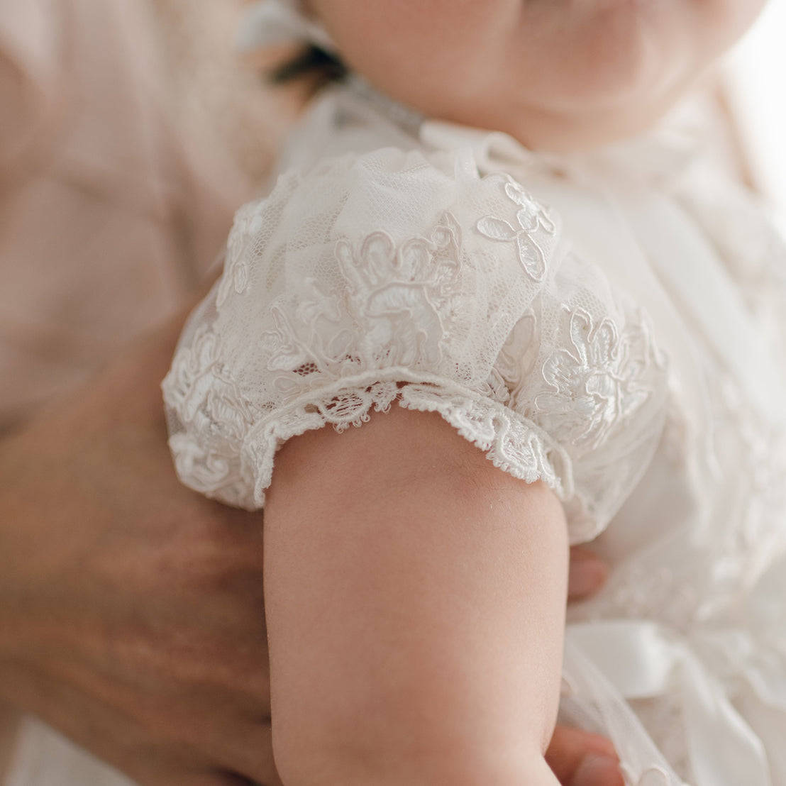 Baby girl soft lace gown sleeve detail