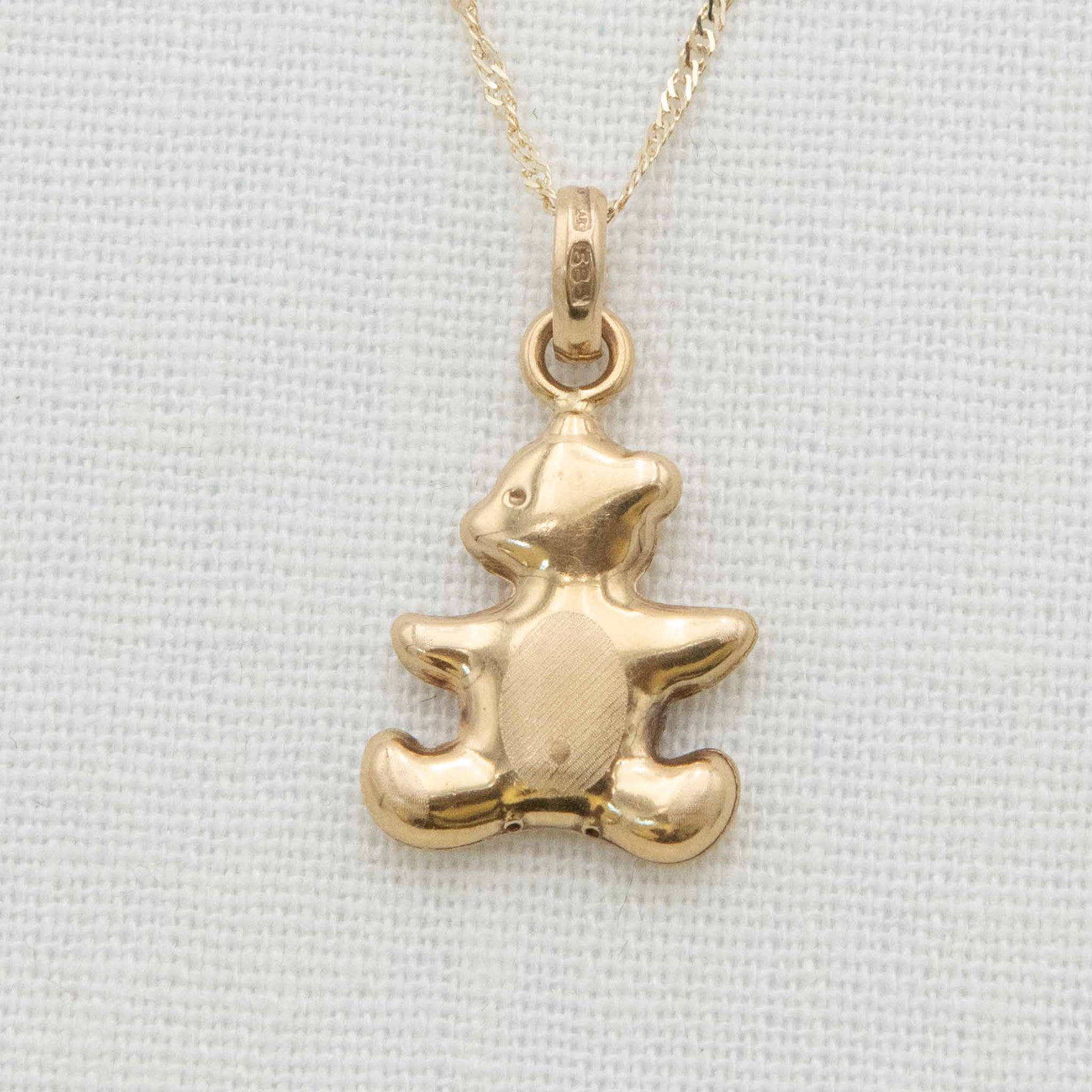 Gold teddy bear charm necklace