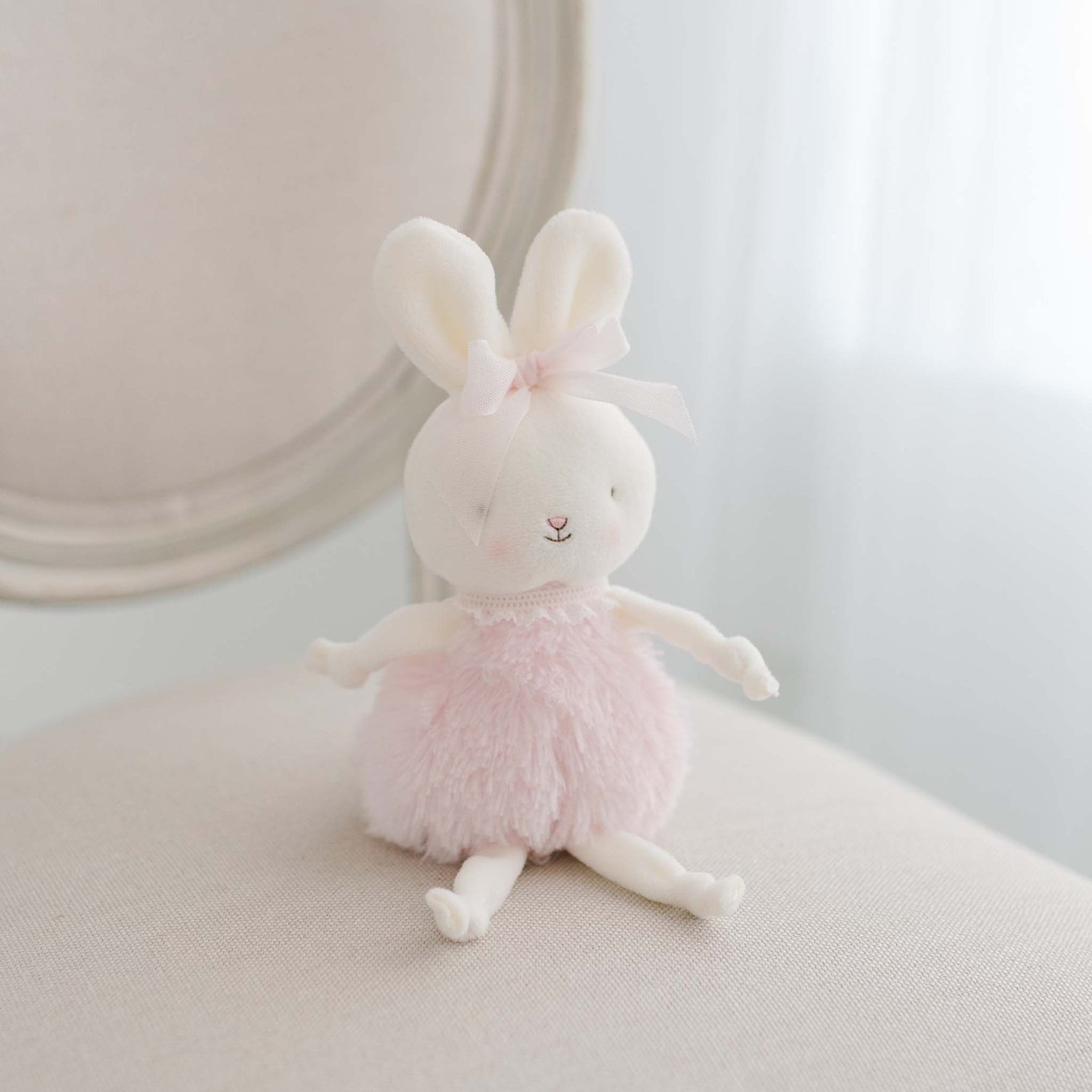 Hailey pink bunny on chair