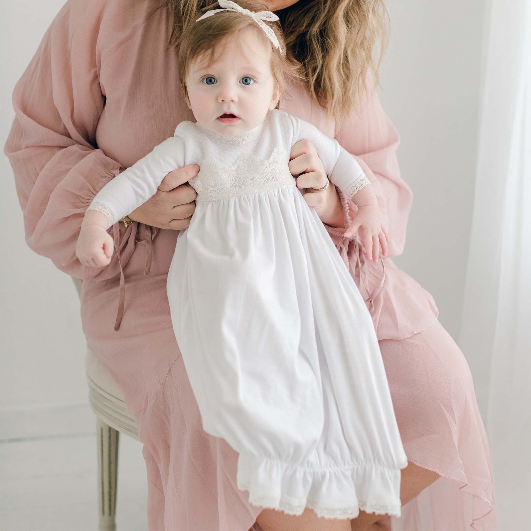 Hailey newborn gown on baby with mom