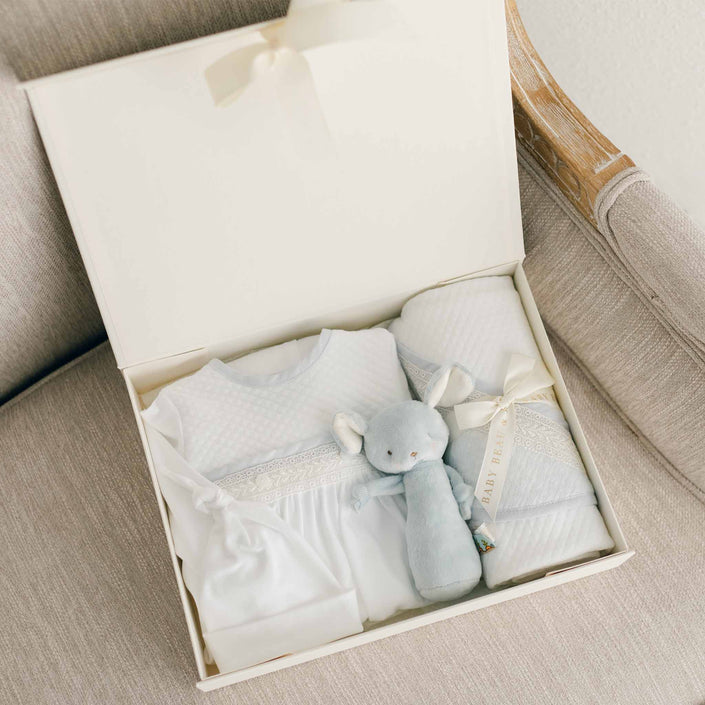 Photo of the Harrison Newborn Gift Set, which includes the Layette Gown, Bonnet (or Knot Cap), Rattle, Blanket, and Gift Box