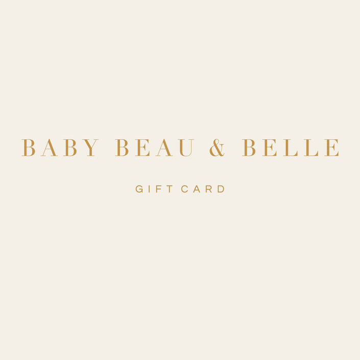 A beautiful image displays the Gift Card from Baby Beau & Belle, featuring glimmering gold text set against a soft cream background. Expertly crafted for gifting, this card comes with straightforward redeeming instructions to ensure a smooth experience.