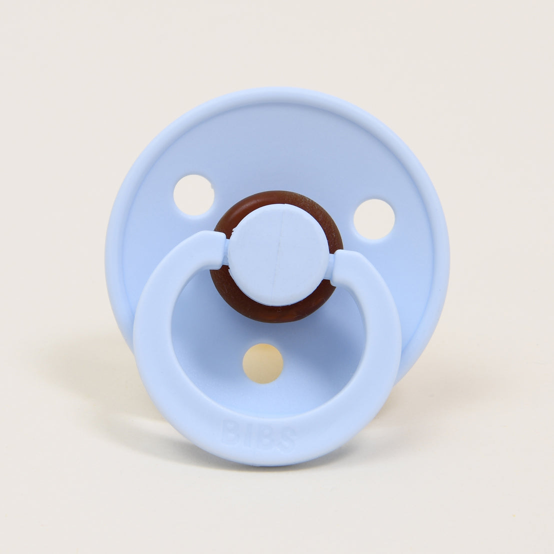 Photo of a baby blue colored pacifier