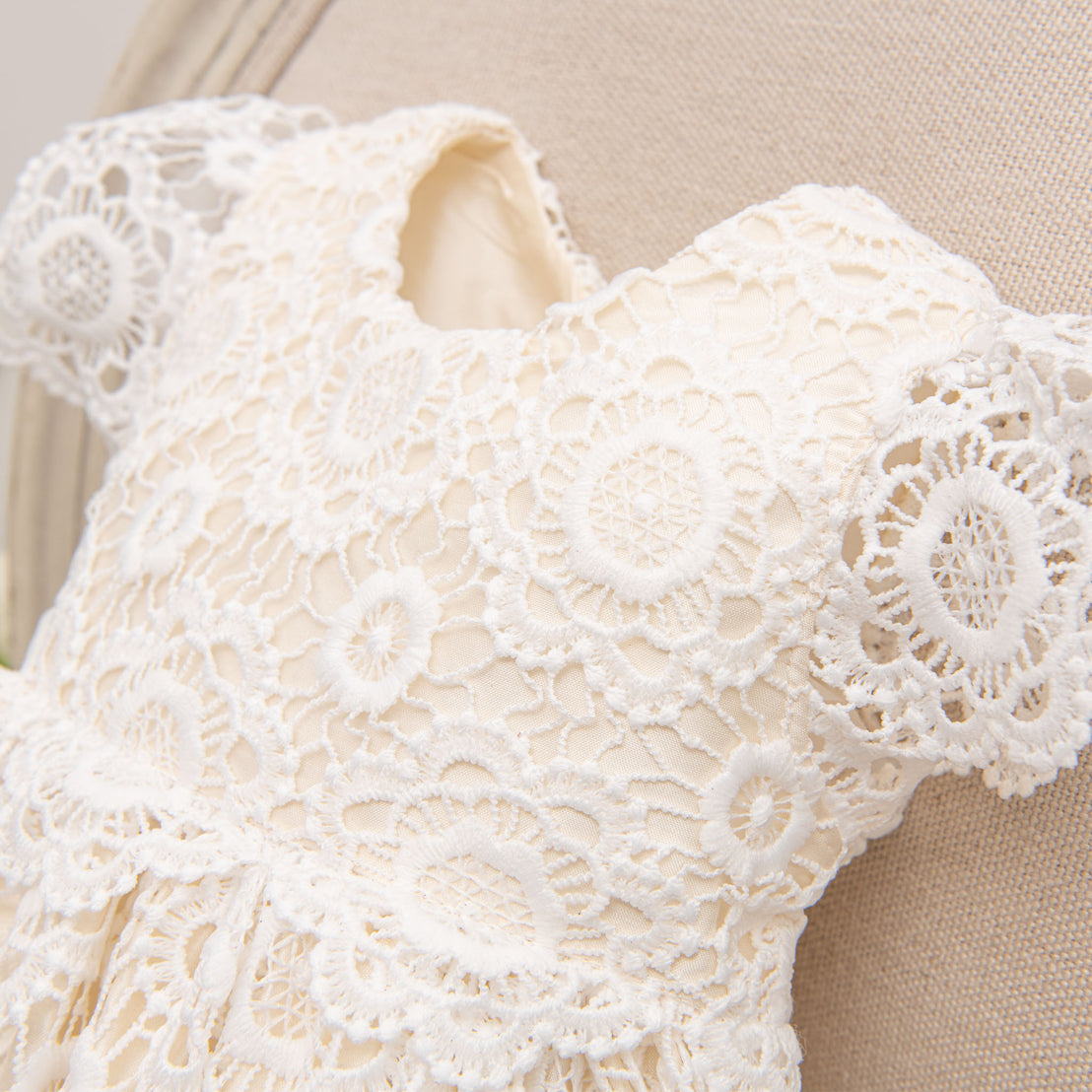 Close up detail of the lace bodice on the Poppy Christening Gown. 