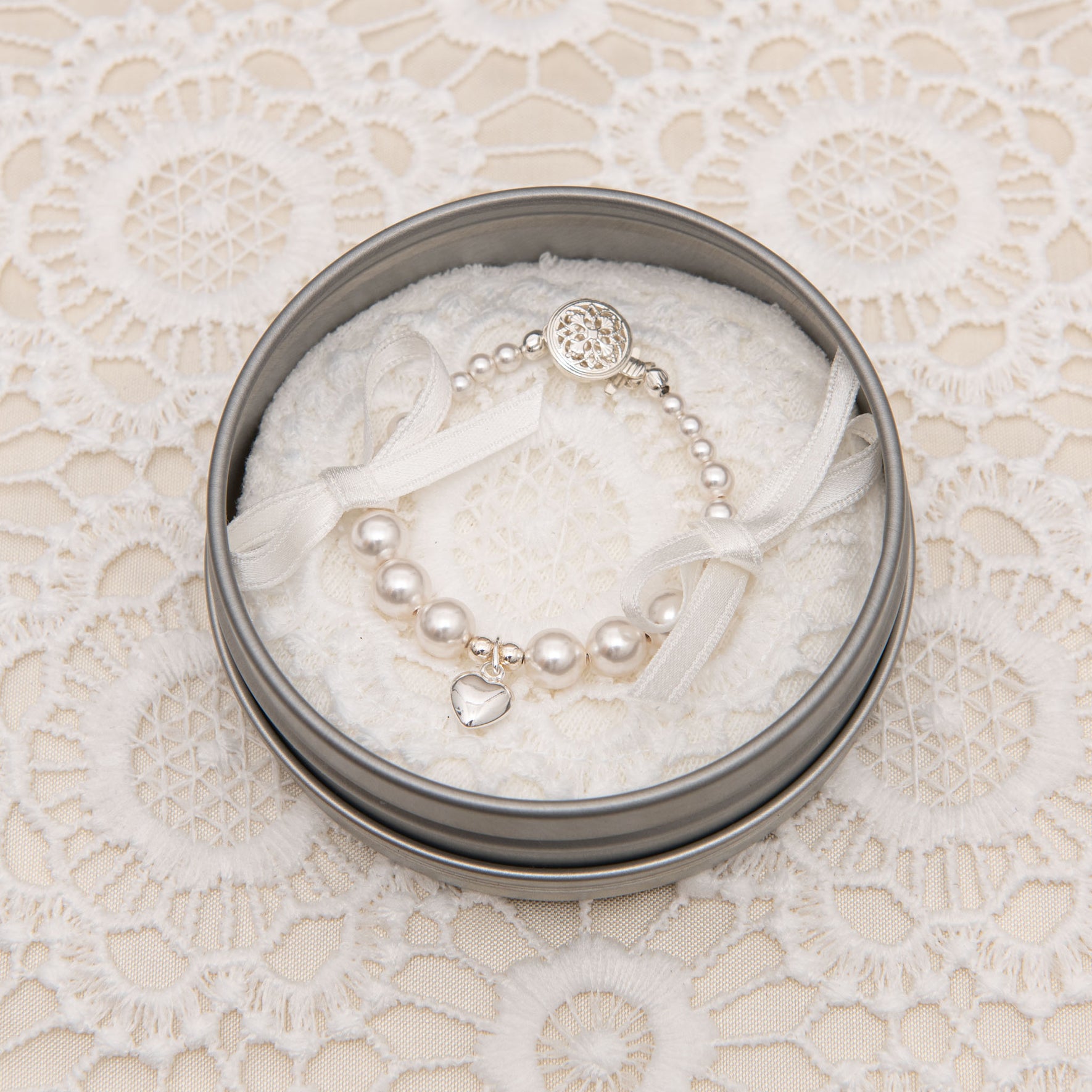 The White Luster Pearl Bracelet delicately placed in the jewelry box.
