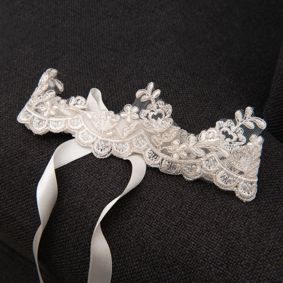 Close up detail of the Penelope lace crown headband.