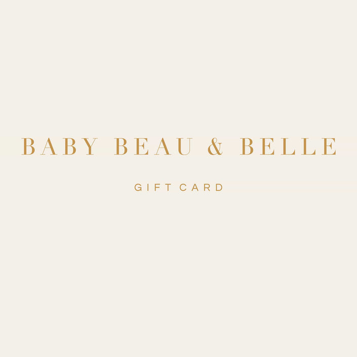 A beautiful image displays the Gift Card from Baby Beau & Belle, featuring glimmering gold text set against a soft cream background. Expertly crafted for gifting, this card comes with straightforward redeeming instructions to ensure a smooth experience.
