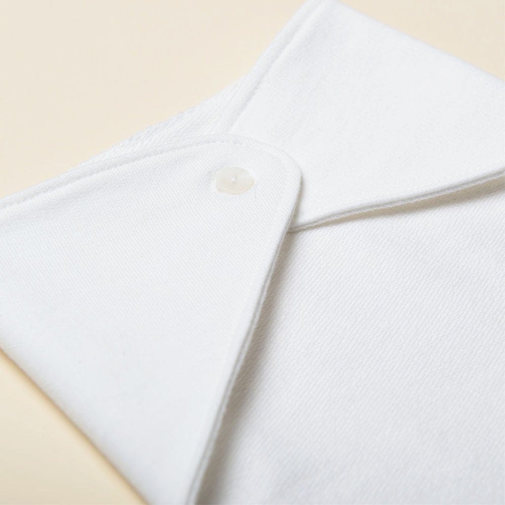 Close up detail showing the back of the Grayson Bandana Bib and the button closure.