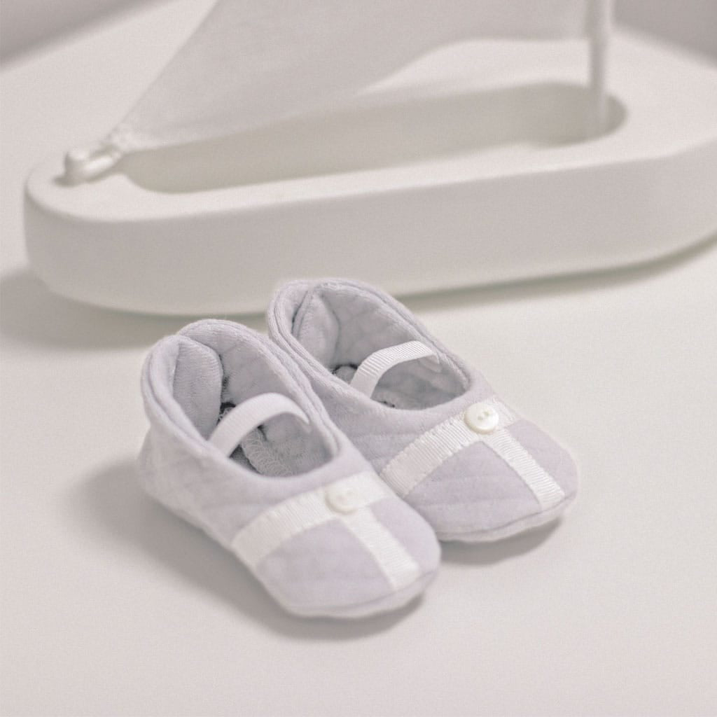 Flat lay grayson grey trim booties. 