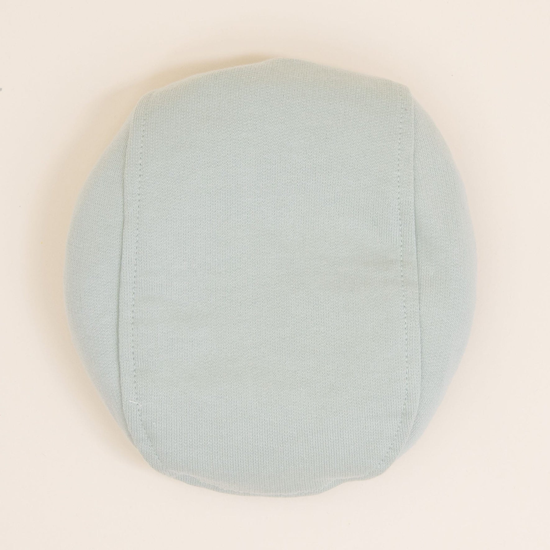 Flat lay photo of the Theodore Newsboy Caps in green.