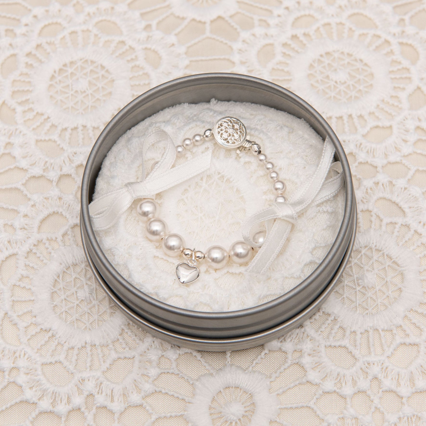 The White Luster Pearl Bracelet delicately placed in the jewelry box.
